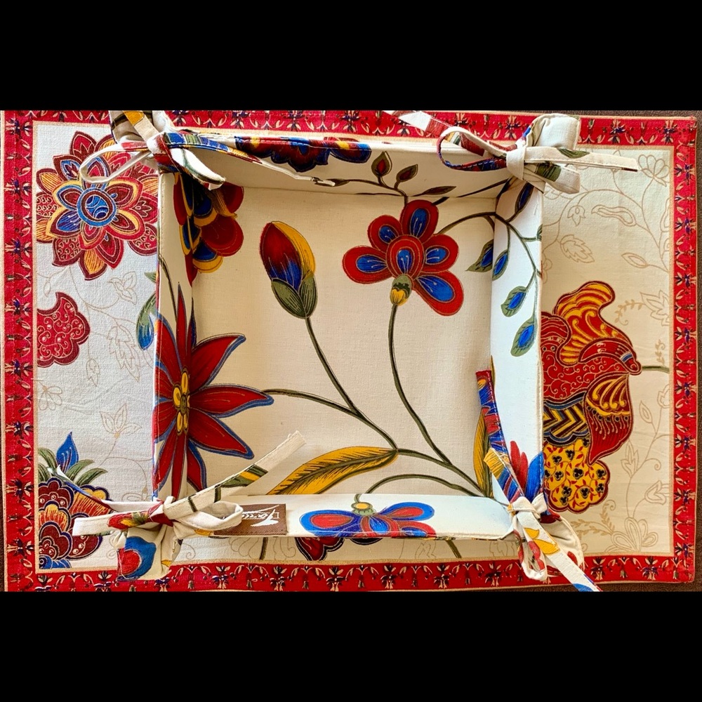 Set of Four Placemats & matching Bread Basket.